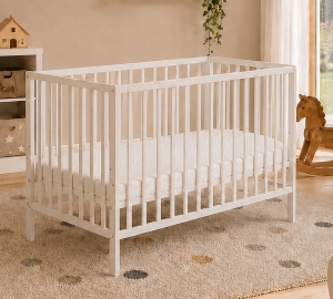 Białe łóżeczko niemowlęce Classic Nest 120x60 marki Amal