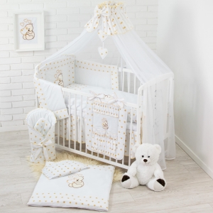 Zestaw dziecięcy do łóżeczka w złote gwiazdki