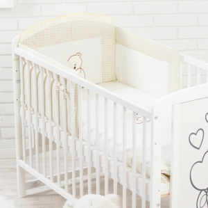 Ochraniacz na szczebelki łóżeczka w kolorze beżowym z delikatnym wzorem