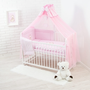 Komplet 10-elementowy z moskitierą i dekoracyjną kokardą  z wiszącymi serduszkami  dla niemowląt.